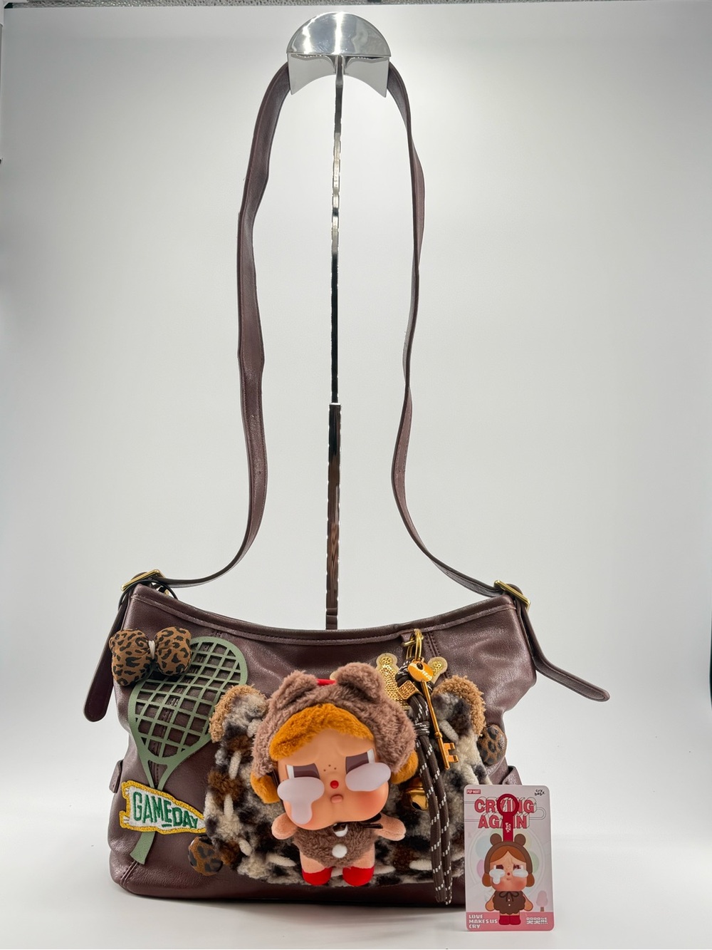Crying Again Brown cross body  Bag with Plush Character Charm - Women